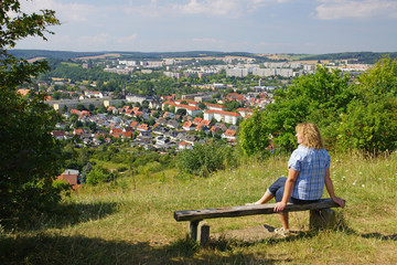 Gera, woman sitting on bench