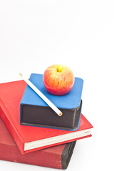 An apple on book