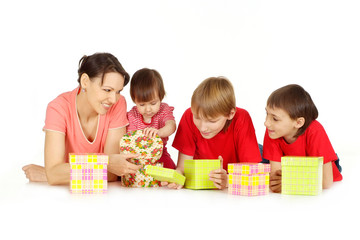 Naklejka premium Mother and her children with presents