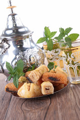 teapot with pastries