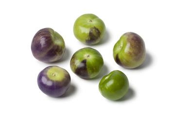 Fresh purple and green tomatillos