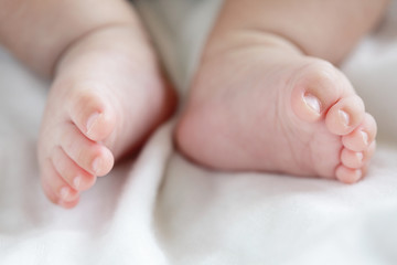 Obraz na płótnie Canvas Little baby feet toe