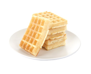 Tasty waffles on plate isolated on white