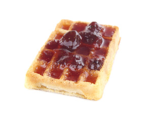 Tasty waffles with jam, isolated on white