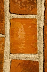Closeup of wall made of bricks background fragment