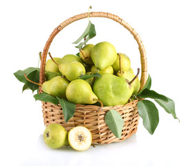 Juicy flavorful pears in basket isolated on white
