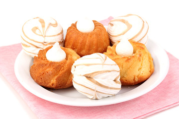 Obraz na płótnie Canvas Appetizing cupcakes with cream isolated on white