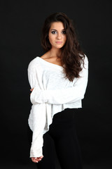 young modern dancer  posing, isolated on black