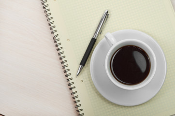 Coffee cup with note book