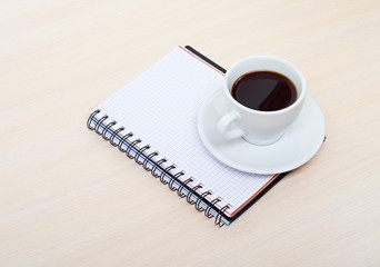 Coffee cup with note book
