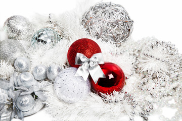 Christmas red and silver decorations on white