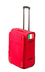 red suitcase with sticker with flag of Italy isolated on white