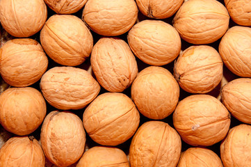 group of walnuts as background