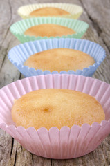 home made cup cake on a timber board