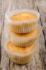 home made cup cake on a timber board