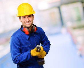 Engineer Holding Drill Machine