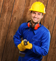 Engineer Holding Drill Machine