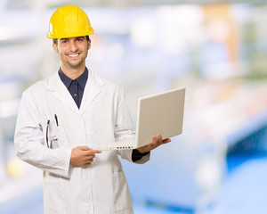 Technician Holding Laptop