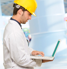 Technician Holding Laptop