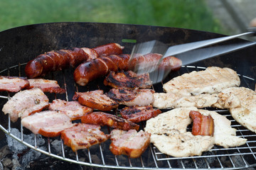 barbecue with delicious grilled meat on grill