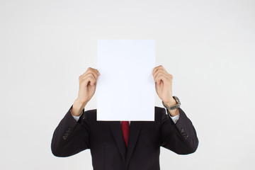 men holding white paper