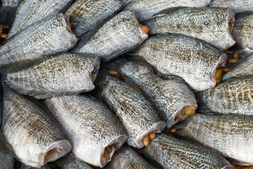 drying snakeskin gourami fishs in threshing basket