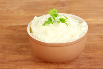 Mashed potato with parsley in the bowl
