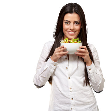 Young Girl Showing A Bowl Of Salad