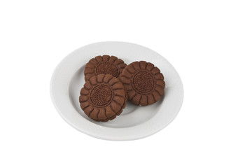 Chocolate cookies on a withe plate isolated