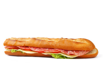 Long sandwich with  salami tomatoes isolated on white