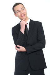 Businessman Thinking and Smiling