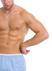Fototapeta premium Closeup on strong abdominal muscles