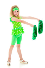 The girl in green with pompoms.