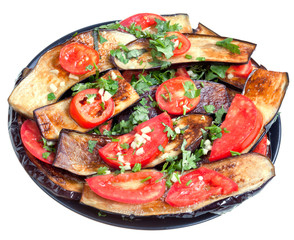fried eggplants with red tomato and garlic
