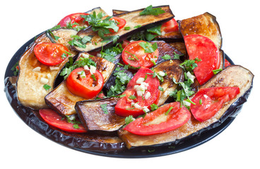 fried eggplants with red tomato