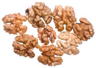 several peeled walnut kernels isolated on white