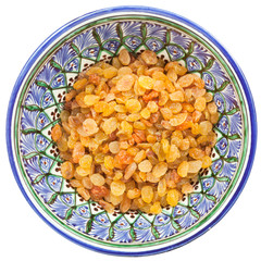 sultana raisin in traditional central asian bowl