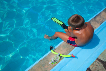 Boy preparing to dive into pool 2