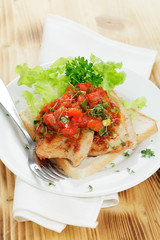 Putensteak mit Tomatensugo