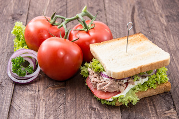Tuna sandwich on wood
