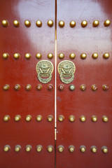 Vintage red door at Temple of Heaven in Beijing, China