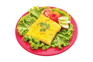 Omelette stuffed with vegetables isolated