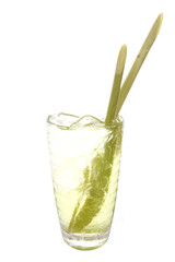 clear glass filled lemongrass drink and fresh lemongrass