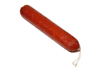 Large Chorizo sausage on a white studio background.
