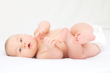 baby reaching his legs
