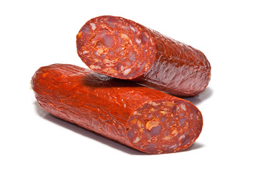 Large Chorizo sausage  isolated on a white studio background.