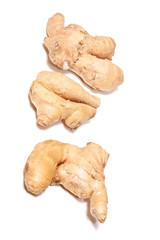 Root ginger isolated on a white studio background.