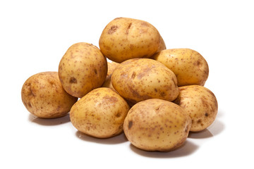 White Potatoes isolated on a white studio background.