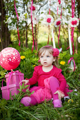 little girl with birthday presents - 45058737