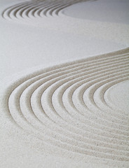 Kurven in feinem Sand